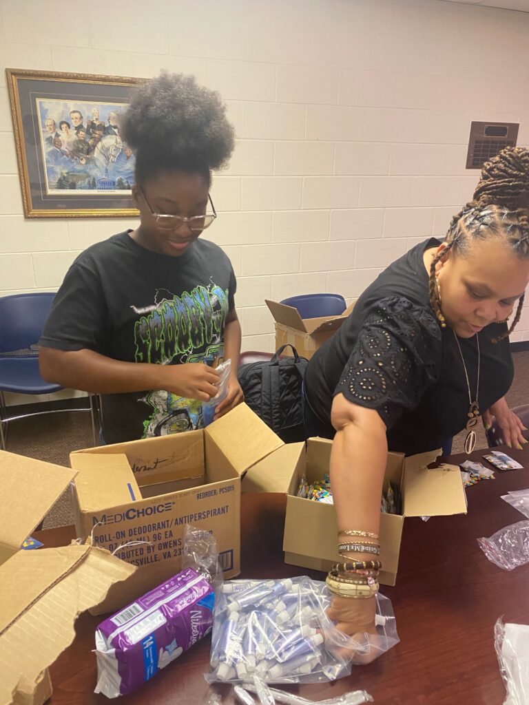 New Revelation Church youth packing toiletry kits